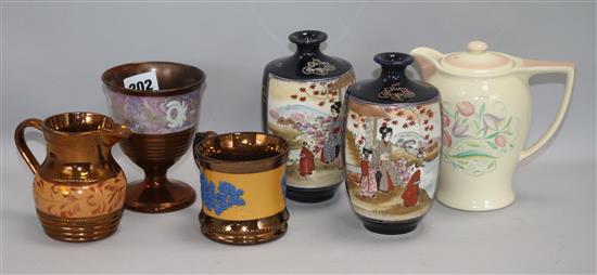 Three items of lustreware, a pair of Satsuma vases and a Susie Cooper jug